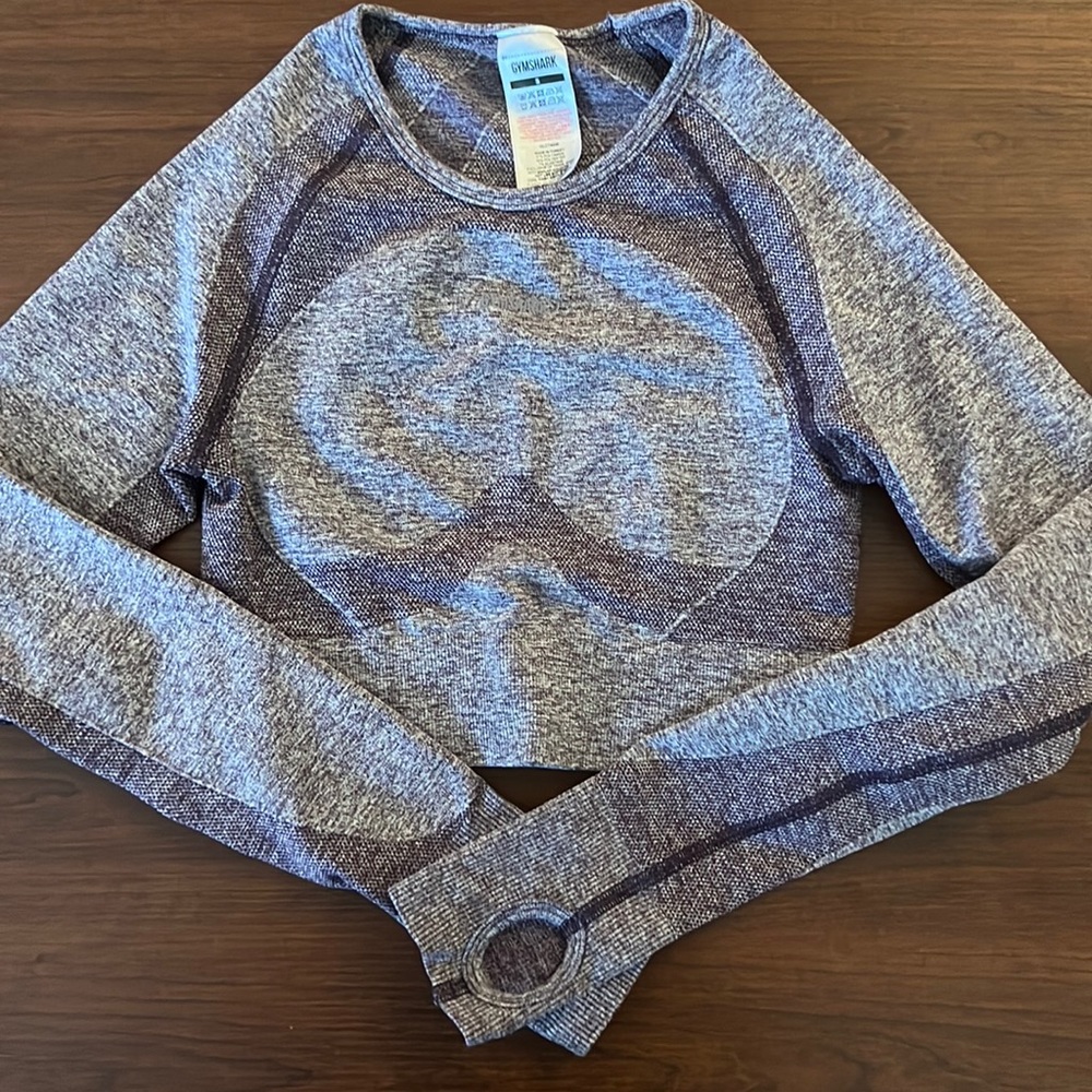 Purple small long sleeve Gymshark crop top with back cutout.